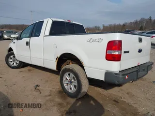 2005 Ford F-150 STX with VIN 1FTRX14W85FB72787, listed as a IAAI auction lot 41702370 with 210,544 mi miles. Bid and sale history available at carsss.com. Image 3.
