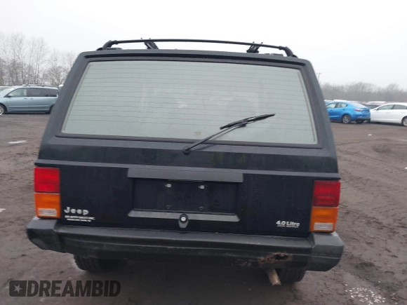 1995 Jeep Cherokee Sport with VIN 1J4FJ68S7SL572730, listed as a IAAI auction lot 41474520 with 189,907 mi miles. Bid and sale history available at carsss.com. Image 16.