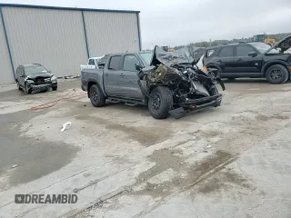 2024 Nissan Frontier Pro-X z VIN 1N6ED1EJ2RN605409, wystawiony jako Copart lot #85559674 z przebiegiem 6 850 mil mil oraz Nie do naprawy • Non repairable. Historia ofert i sprzedaży dostępna na DreamBid. Obrazek 11.