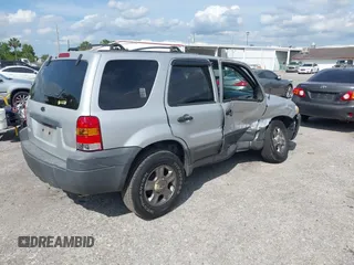 2005 Ford Escape XLS Value with VIN 1FMYU02Z35KD87671, listed as a IAAI auction lot 41880824 with 278,689 mi miles. Bid and sale history available at carsss.com. Image 4.