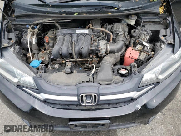 2015 Honda Fit EX-L z VIN 3HGGK5H89FM701322, wystawiony jako Copart lot #56565885 z przebiegiem 195 154 mil mil oraz Szkoda całkowita • Salvage title. Historia ofert i sprzedaży dostępna na DreamBid. Obrazek 11.