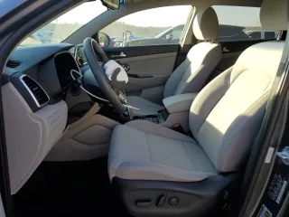 2019 Hyundai Tucson Sport with VIN KM8J33AL7KU950109, listed as a Copart auction lot 86636104 with 53,369 mi miles and Salvage Title. Bid and sale history available at carsss.com. Image 7.
