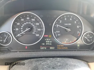 2013 BMW 3 Series 328i xDrive z VIN WBA3B3C5XDF533439, wystawiony jako Copart lot #62130615 z przebiegiem 125 712 mil mil oraz Szkoda całkowita • Salvage title. Historia ofert i sprzedaży dostępna na DreamBid. Obrazek 9.