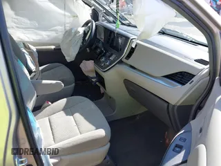 2015 Toyota Sienna L with VIN 5TDZK3DC4FS669496, listed as a IAAI auction lot 41691430 with 119,427 mi miles. Bid and sale history available at carsss.com. Image 5.
