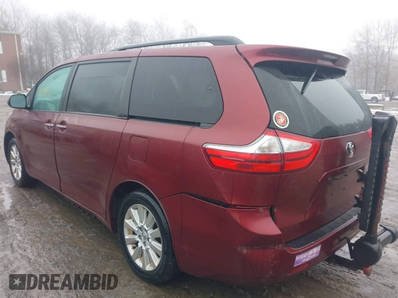 2015 Toyota Sienna Ltd with VIN 5TDDK3DC5FS106080, listed as a IAAI auction lot 41579010 with 133,495 mi miles. Bid and sale history available at carsss.com. Image 3.