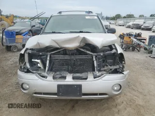 2005 GMC Envoy SLT with VIN 1GKDT13S852330514, listed as a Copart auction lot 71190504 with 203,616 mi miles and Salvage Title. Bid and sale history available at carsss.com. Image 5.