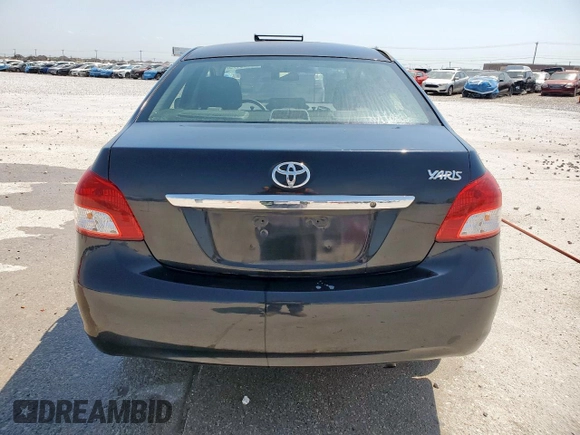 2012 Toyota Yaris with VIN JTDBT4K33CL036296, listed as a Copart auction lot 52955175 with 91,744 mi miles and Clean title. Bid and sale history available at DreamBid. Image 6.