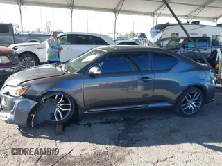 2016 Scion tC with VIN JTKJF5C78GJ014184, listed as a IAAI auction lot 41622575 with 128,520 mi miles. Bid and sale history available at carsss.com. Image 14.