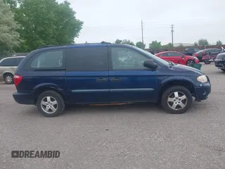2005 Dodge Caravan SE with VIN 1D4GP24R95B420644, listed as a IAAI auction lot 42302868 with 256,701 mi miles and . Bid and sale history available at DreamBid. Image 13.