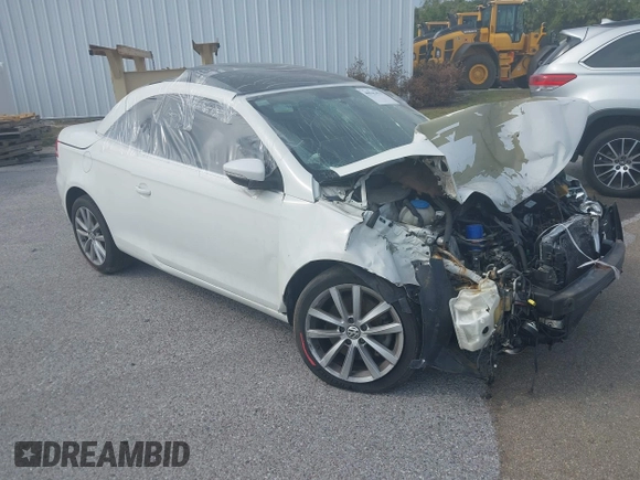 2012 Volkswagen Eos Komfort with VIN WVWBW7AH9CV017620, listed as a IAAI auction lot 40945479 with 96,444 mi miles and . Bid and sale history available at DreamBid. Image 1.