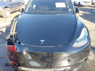 2023 Tesla Model Y Performance with VIN 7SAYGDEF6PF854797, listed as a IAAI auction lot 41319332 with 46,132 mi miles and . Bid and sale history available at DreamBid. Image 10.