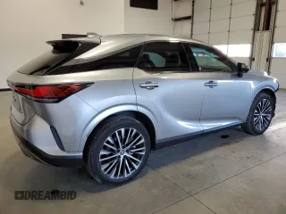 2023 Lexus RX with VIN 2T2BBMCA3PC003789, listed as a Copart auction lot 54011604 with 14,267 mi miles. Bid and sale history available at carsss.com. Image 3.