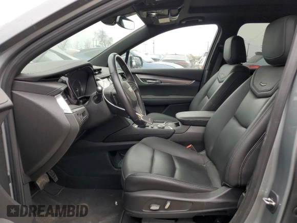2023 Cadillac XT6 FWD Luxury z VIN 1GYKPAR47PZ147139, wystawiony jako Copart lot #50783595 z przebiegiem 27 684 mil mil oraz Szkoda całkowita • Salvage title. Historia ofert i sprzedaży dostępna na DreamBid. Obrazek 7.