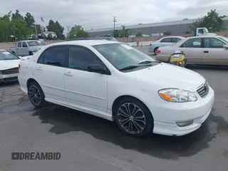 2004 Toyota Corolla CE with VIN JTDBR32E440052035, listed as a IAAI auction lot 42218301 with 299,999 mi miles. Bid and sale history available at carsss.com. Image 1.
