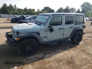 2023 Jeep Wrangler Willys with VIN 1C4HJXDG9PW615072, listed as a Copart auction lot 59606805 with 72,969 mi miles and Salvage title. Bid and sale history available at DreamBid. Image 1.