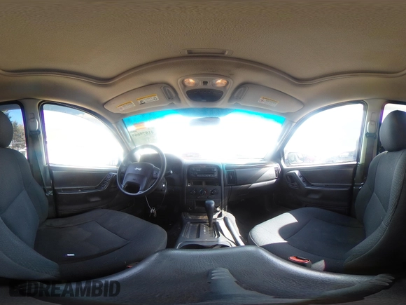 2003 Jeep Grand Cherokee Laredo with VIN 1J4GX48S53C504225, listed as a IAAI auction lot 41879669 with 247,246 mi miles. Bid and sale history available at carsss.com. Image 20.