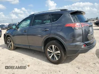2018 Toyota RAV4 XLE with VIN 2T3WFREV2JW409292, listed as a Copart auction lot 61577355 with 189,258 mi miles and Salvage title. Bid and sale history available at DreamBid. Image 2.
