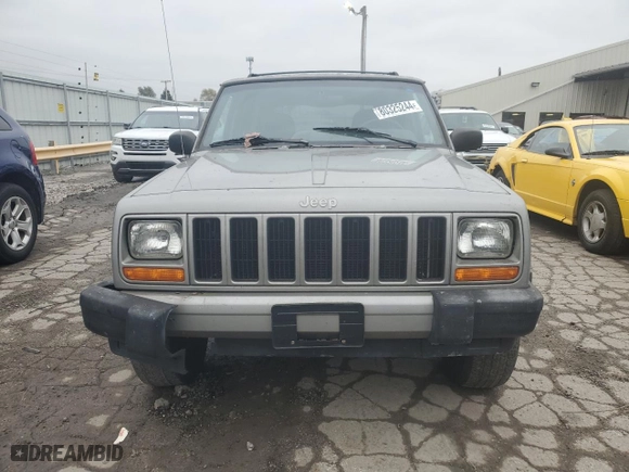 2000 Jeep Cherokee Police with VIN 1J4FF48S8YL181942, listed as a Copart auction lot 80325244 with 153,497 mi miles and Salvage Title. Bid and sale history available at carsss.com. Image 5.