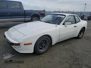1984 Porsche 944 with VIN WP0AA0944EN453622, listed as a Copart auction lot 85871944 with 92,382 mi miles and Salvage Title. Bid and sale history available at DreamBid. Image 1.
