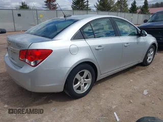 2015 Chevrolet Cruze LT with VIN 1G1PC5SB9F7120907, listed as a IAAI auction lot 41999469 with 104,636 mi miles and . Bid and sale history available at DreamBid. Image 4.