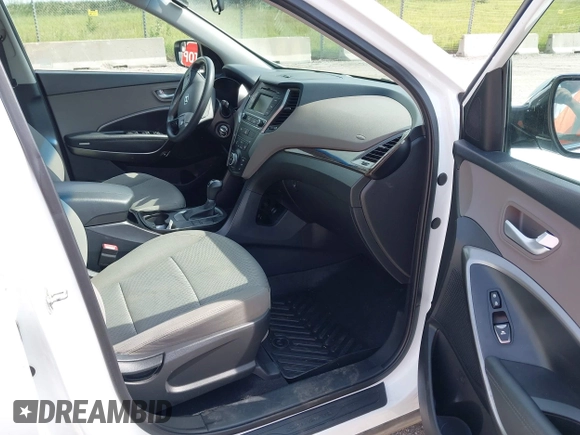 2017 Hyundai Santa Fe 2.4L with VIN 5NMZTDLB5HH018198, listed as a IAAI auction lot 42523632 with 144,883 mi miles and . Bid and sale history available at DreamBid. Image 5.
