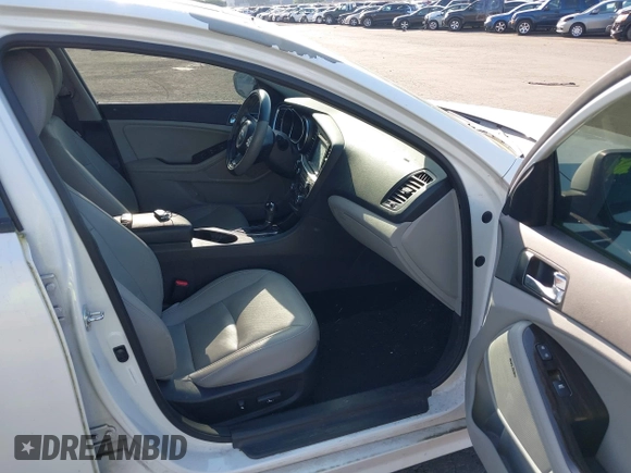 2014 Kia Optima EX with VIN 5XXGN4A73EG314797, listed as a IAAI auction lot 42136952 with 71,310 mi miles and . Bid and sale history available at carsss.com. Image 5.