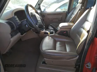 2000 Land Rover Discovery Cloth with VIN SALTY1548YA251953, listed as a Copart auction lot 85580634 with 187,571 mi miles and Salvage Title. Bid and sale history available at DreamBid. Image 7.