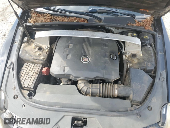 2012 Cadillac CTS z VIN 1G6DC5E52C0158356, wystawiony jako Copart lot #54679535 z przebiegiem 147 628 mil mil oraz Szkoda całkowita • Salvage title. Historia ofert i sprzedaży dostępna na DreamBid. Obrazek 11.