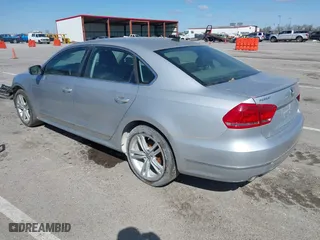 2013 Volkswagen Passat TDI SEL Premium with VIN 1VWCN7A38DC013998, listed as a IAAI auction lot 41853675 with 171,556 mi miles. Bid and sale history available at carsss.com. Image 3.