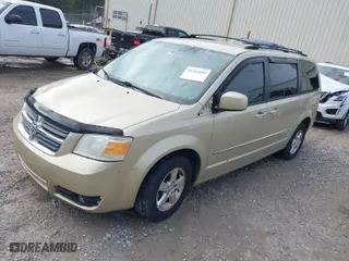 2010 Dodge Grand Caravan SXT with VIN 2D4RN5DX5AR290131, listed as a IAAI auction lot 41314452 with 194,819 mi miles. Bid and sale history available at carsss.com. Image 2.