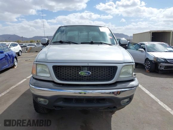 2003 Ford F-150 XLT with VIN 1FTRW08LX3KC79700, listed as a IAAI auction lot 41680562 with 131,052 mi miles. Bid and sale history available at carsss.com. Image 13.