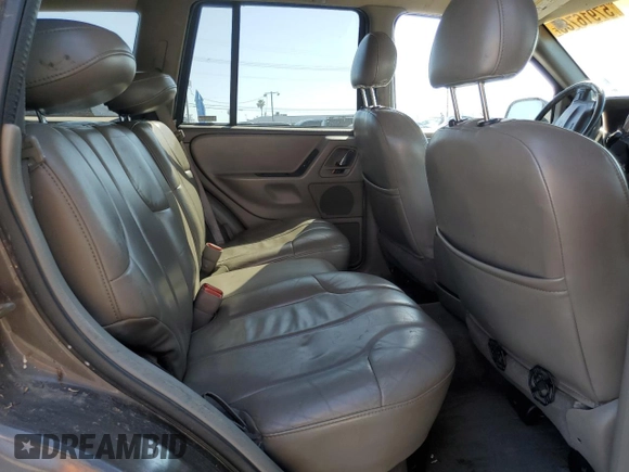 2000 Jeep Grand Cherokee Laredo with VIN 1J4G248S2YC377133, listed as a Copart auction lot 57916785 with 217,525 mi miles and Salvage title. Bid and sale history available at DreamBid. Image 11.