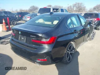 2022 BMW 3 Series 330i xDrive with VIN 3MW5R7J02N8C61109, listed as a IAAI auction lot 41392040 with 21,060 mi miles. Bid and sale history available at carsss.com. Image 4.