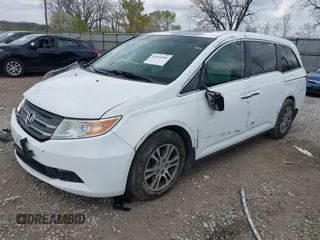 2012 Honda Odyssey EX-L with VIN 5FNRL5H67CB082903, listed as a IAAI auction lot 42015904 with 208,300 mi miles and . Bid and sale history available at carsss.com. Image 17.
