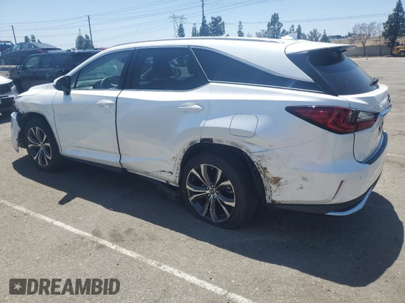 2022 Lexus RX 350L с VIN JTJHZKEAXN2029004, выставлен на аукционе Copart как лот 57858485 с пробегом 94 701 миль миль и Списание • Salvage title. История ставок и продаж доступна на DreamBid. Изображение 2.