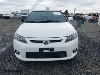 2013 Scion tC with VIN JTKJF5C70D3065601, listed as a IAAI auction lot 41272881 with 110,828 mi miles. Bid and sale history available at carsss.com. Image 12.