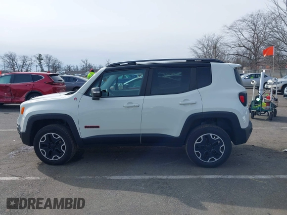 2015 Jeep Renegade Trailhawk with VIN ZACCJBCT6FPB32422, listed as a IAAI auction lot 41618410 with 42,219 mi miles and . Bid and sale history available at DreamBid. Image 14.