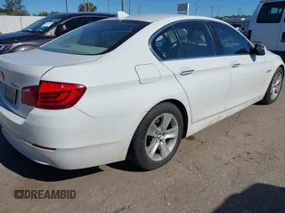 2013 BMW 5 Series 528i with VIN WBAXG5C56DDY31982, listed as a IAAI auction lot 40906428 with 248,336 mi miles and . Bid and sale history available at carsss.com. Image 4.