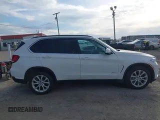 2016 BMW X5 xDrive35i with VIN 5UXKR0C5XG0P21683, listed as a IAAI auction lot 41717151 with 98,696 mi miles. Bid and sale history available at carsss.com. Image 13.
