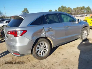 2017 Acura RDX w/Technology Pkg with VIN 5J8TB3H50HL014744, listed as a IAAI auction lot 41359392 with 97,297 mi miles. Bid and sale history available at carsss.com. Image 4.