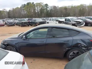 2024 Tesla Model Y with VIN 7SAYGDED3RA303113, listed as a IAAI auction lot 41915760 with 12,917 mi miles and . Bid and sale history available at DreamBid. Image 13.