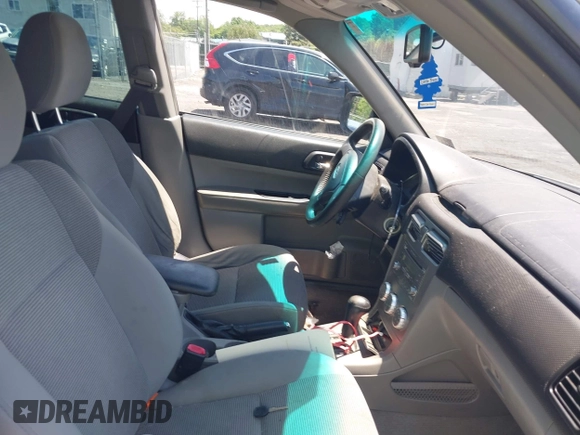 2007 Subaru Forester X with VIN JF1SG65617H725645, listed as a IAAI auction lot 42660092 with 123,228 mi miles and . Bid and sale history available at DreamBid. Image 5.