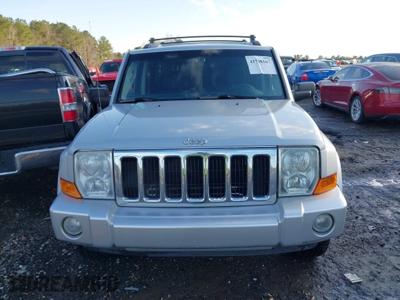 2010 Jeep Commander Sport z VIN 1J4RH4GK3AC158874, wystawiony jako IAAI lot #41708167 z przebiegiem 165 002 mil mil oraz . Historia ofert i sprzedaży dostępna na DreamBid. Obrazek 6.