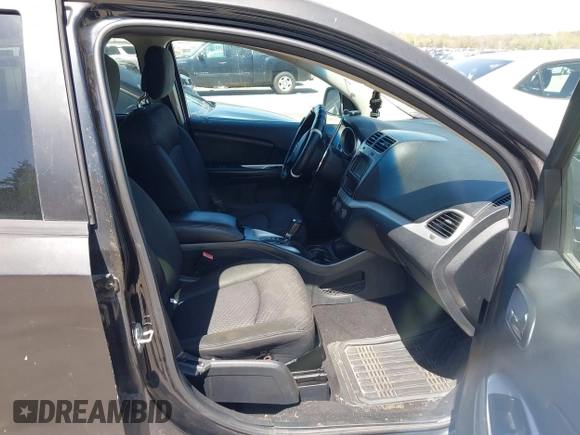 2011 Dodge Journey Mainstreet with VIN 3D4PG1FG0BT527937, listed as a IAAI auction lot 42003997 with 209,894 mi miles and . Bid and sale history available at carsss.com. Image 5.