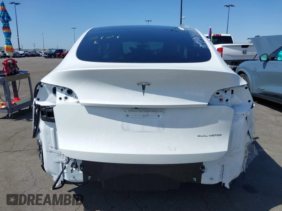 2023 Tesla Model Y Long Range with VIN 7SAYGDEE2PF632121, listed as a IAAI auction lot 41798780 with 53,773 mi miles. Bid and sale history available at carsss.com. Image 16.