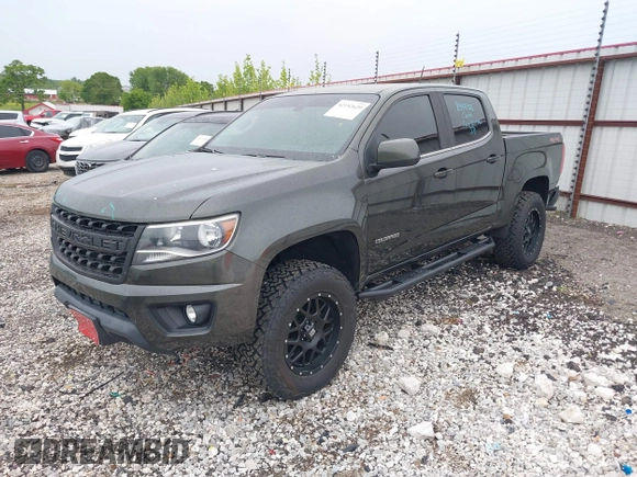 2018 Chevrolet Colorado 4WD LT z VIN 1GCGTCEN2J1235085, wystawiony jako IAAI lot #42192629 z przebiegiem 83 914 mil mil oraz . Historia ofert i sprzedaży dostępna na DreamBid. Obrazek 17.