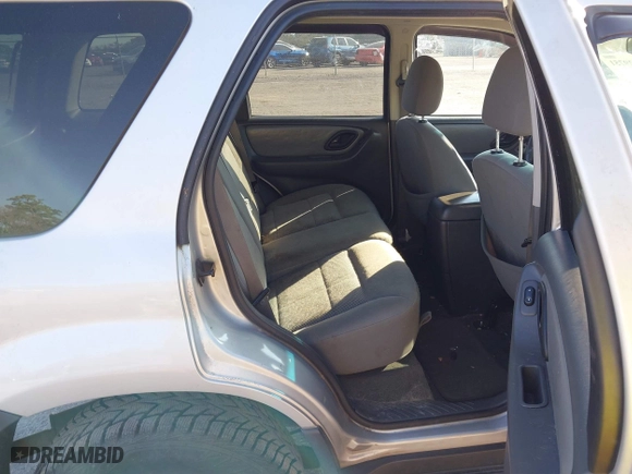 2006 Ford Escape XLT with VIN 1FMCU03166KB47650, listed as a IAAI auction lot 41529751 with 153,962 mi miles. Bid and sale history available at carsss.com. Image 8.