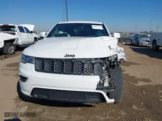 2018 Jeep Grand Cherokee Laredo E with VIN 1C4RJFAGXJC435658, listed as a IAAI auction lot 40659459 with 97,827 mi miles. Bid and sale history available at carsss.com. Image 12.