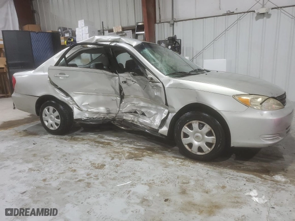 2004 Toyota Camry LE with VIN 4T1BE32K94U915756, listed as a Copart auction lot 50761005 with 404,136 mi miles and Salvage Title. Bid and sale history available at carsss.com. Image 4.