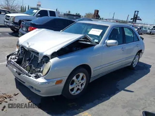 2002 Mercedes-Benz E-Class with VIN WDBJF65J32B485084, listed as a IAAI auction lot 41976183 with 1 mi miles. Bid and sale history available at carsss.com. Image 2.